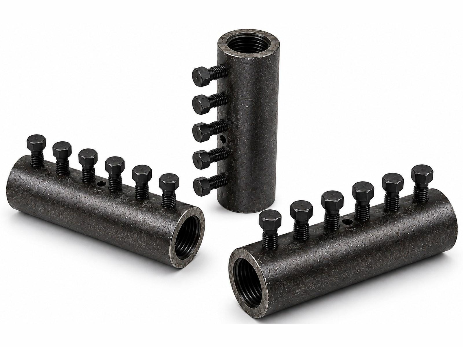 Three MBT rebar couplers with rows of shear-off bolts along the sleeve